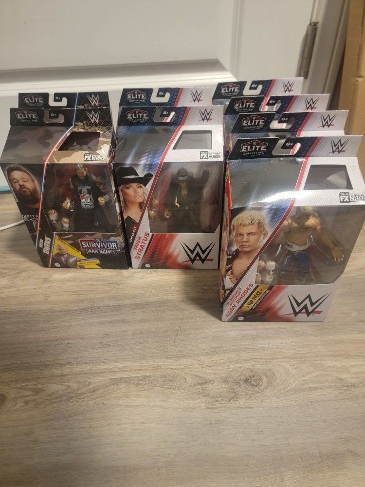 Lot of 8 WWE Elite Action Figures Cody Rhodes, Trish Stratus, Kevin Owens