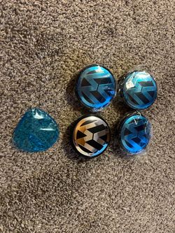 4- VW center wheel caps new
