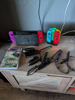 Nintendo Switch with Tears of the Kingdom, accessories, and controller