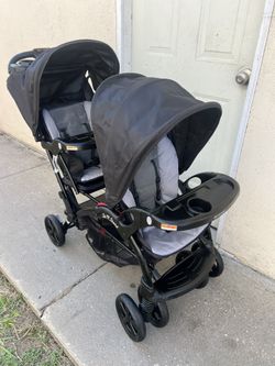 BABY TREND DOUBLE SIT AND STAND