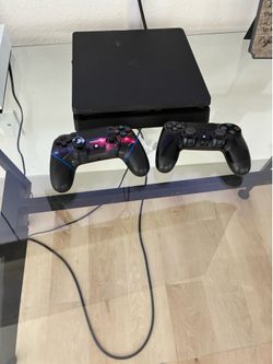 PS4 slim with 2 controllers for sale