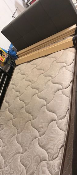 twin size dark grey bed with mattress