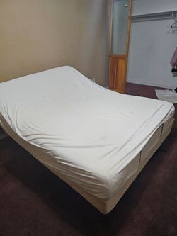 Queen size Tempur-Pedic mattress with elevation and massage