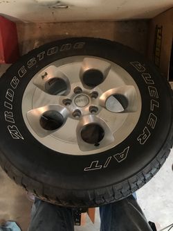 Stock Jeep wheel and tire