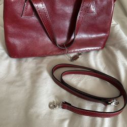 Red leather fossil bag