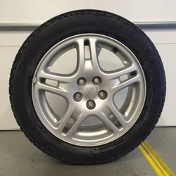 A set of 4 2002 Subaru Wrx OEM stock rims with tire