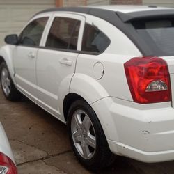 09 DODGE CALIBER SXT 117K 4CYL 2.0L DOHC 16VALVE A/C HEAT TINTED WINDOWS LUGGAGE RACK TAILGATE ALUMINUM RIMS RUNS AND DRIVES EXCELLENT. 