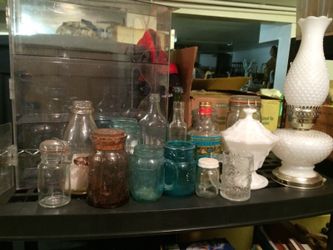 Antique mason jars and other bottles