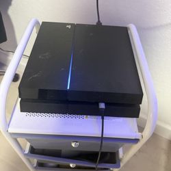 PS4 Pro with 2 controllers and 9 games