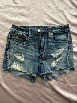 American Eagle jean shorts with lace pockets