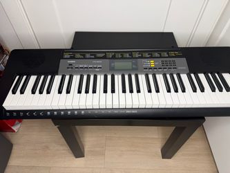 A Casio  CTK -2500 ,A 61 - KEY  Portable  Electronic  Keyboard   designed for Beginners