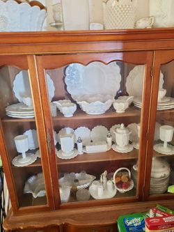 A complete milk glass China set