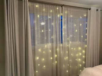 Black out curtains + sheer curtains + lights