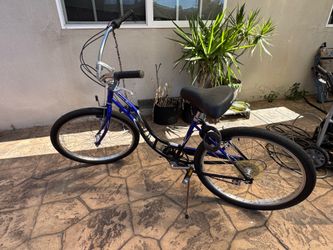 Blue Schwinn Jaguar 7 Speed Beach Cruiser
