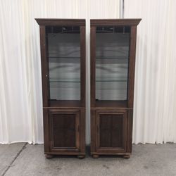 Pair of Hammary Wood Tall Display Cabinets with Glass Shelves