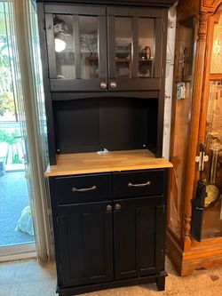 China cabinet black with wood countertop