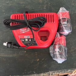 Milwaukee Charger And Batteries