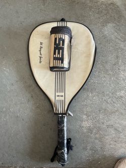 one racquetball racquet plus one tennis racquet