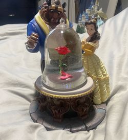 Vintage beauty and the beast snow globe