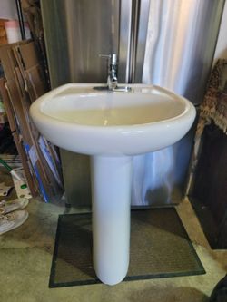 White Ceramic Sink with Faucet