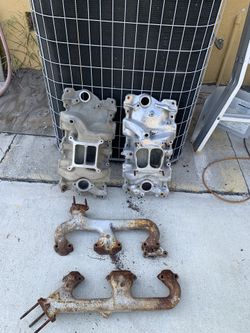 Holley and Edelbrock intake Manifold for Chevy and also exhaust