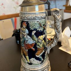 Vintage German beer stein with music box
