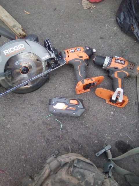 Rigid Skill Saw And Drill And Impact One Battery