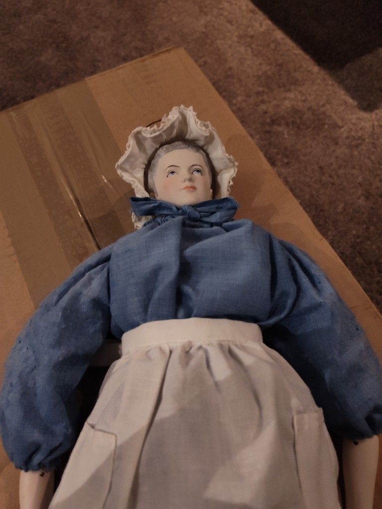 Cloth And Porcelain Doll With The Extra Outfit