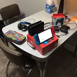 Nintendo Switch OLED w/ Pro Controller, 3 Games and More
