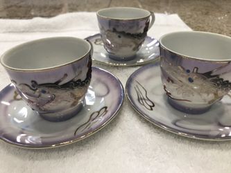 Collectibles Tea Cups. Set of 3. Made in Japan. Beautiful art work.