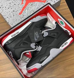 Men's AJ4 black, size 10.5 US, brand new never worn
