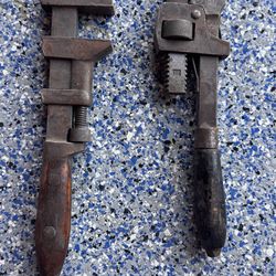 Antique pipe, wrenches