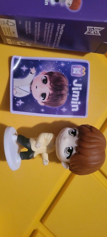 McDonald's TinyTAN x BTS Happy Meal toy and accompanying trading card featuring the character of BTS member Jimin