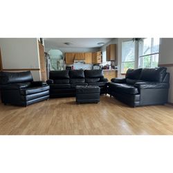 Black leather sofa, Set Of Four Pieces 