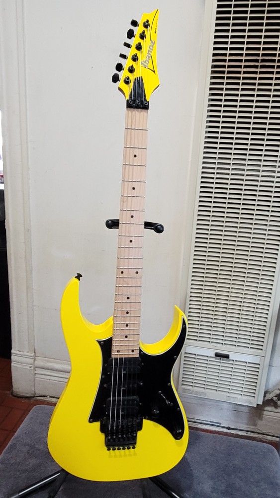 IBANEZ 6 STRINGS ELECTRIC GUITAR MODEL RG350M MADE IN INDONESIA WITH FLOYD ROSE TREMOLO IN YELLOW COLOR