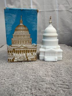 vintage Avon "The Capitol" decanter containing Wild Country after shave