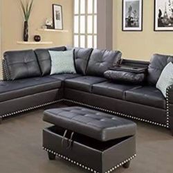 Black Leather Sectional Couch With Drop Down Table And Ottoman