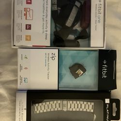 2 “Fitbit One” And Accessories 