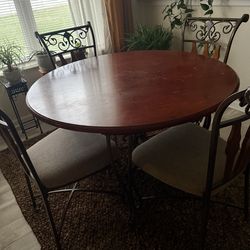 Beautiful table and four chairs.
