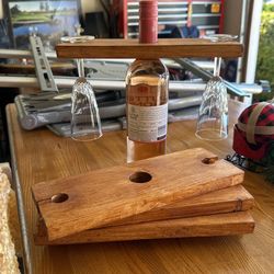 Wood piece to hold a bottle and glasses