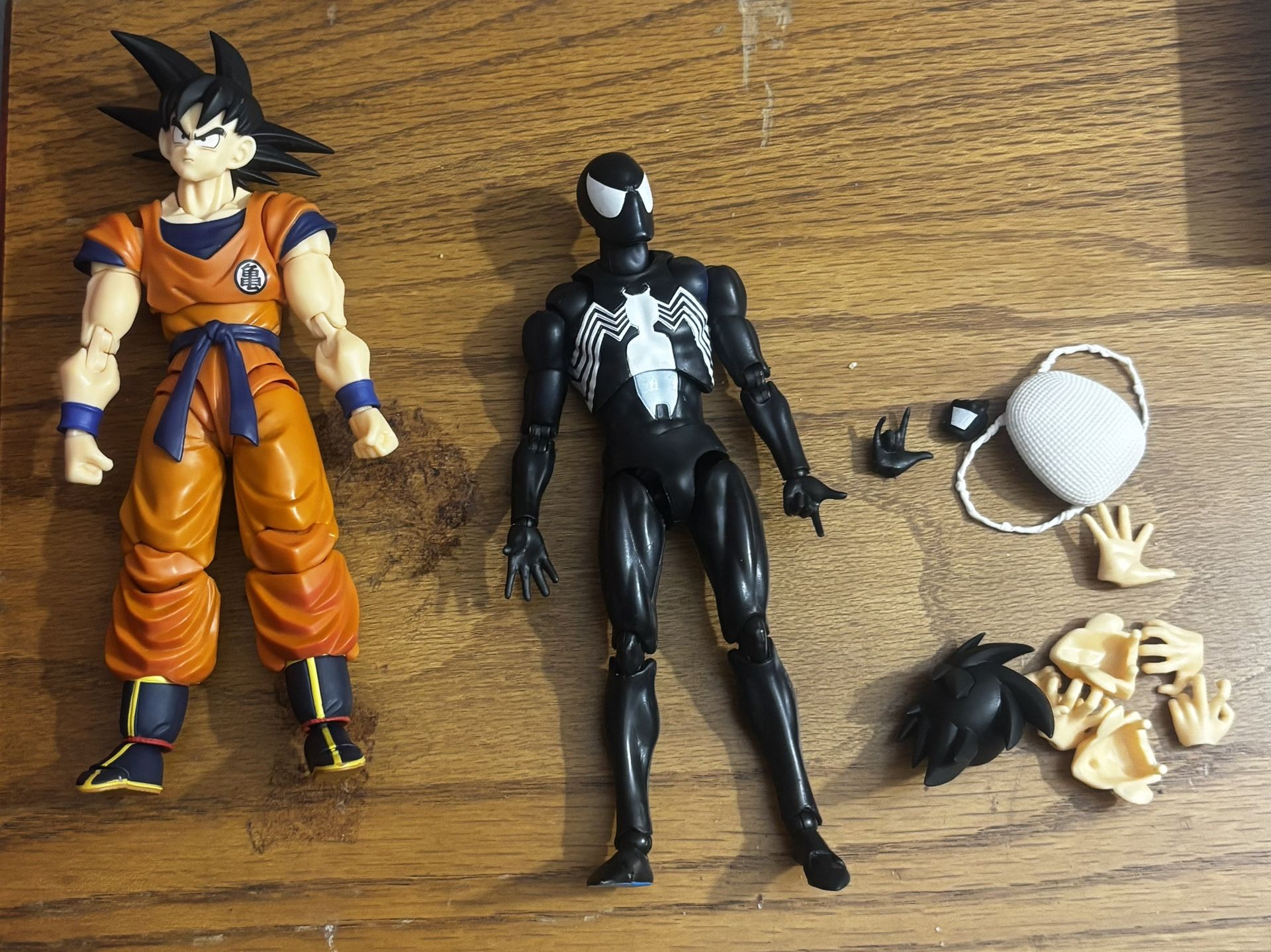 Mafex Symbiote spiderman and SHF lowest born Son Goku
