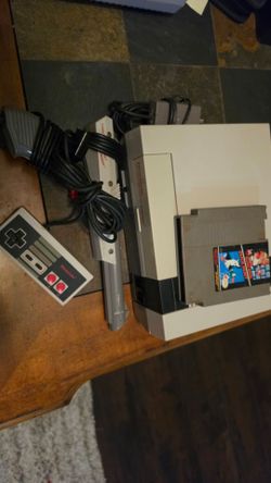 Nintendo with game and zapper