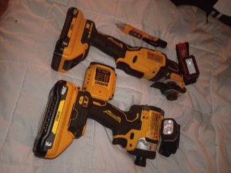 IMPACT DRIVER AND MULTI-TOOL PLUS BATTERIES N LIGHTS