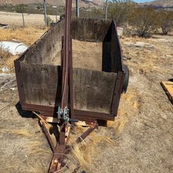 Rustic Dump Trailer With Wooden Sides