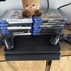 PS4 With Games And Controllers