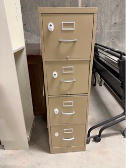 Tall metal filling cabinet