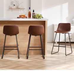 New set of three 26 inch brown, faux leather barstools