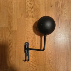 Motorcycle helmet holder