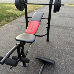 Bench Press With Barbell And Weights 