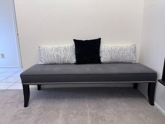 Bench with throw pillows